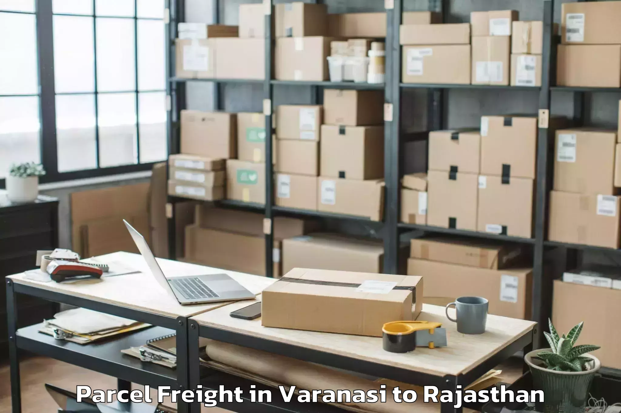 Varanasi to Iihmr University Jaipur Parcel Freight Booking